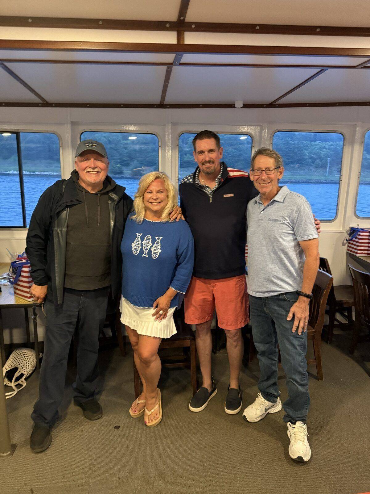 Chairs Hickey, Ball and Parini with a guest